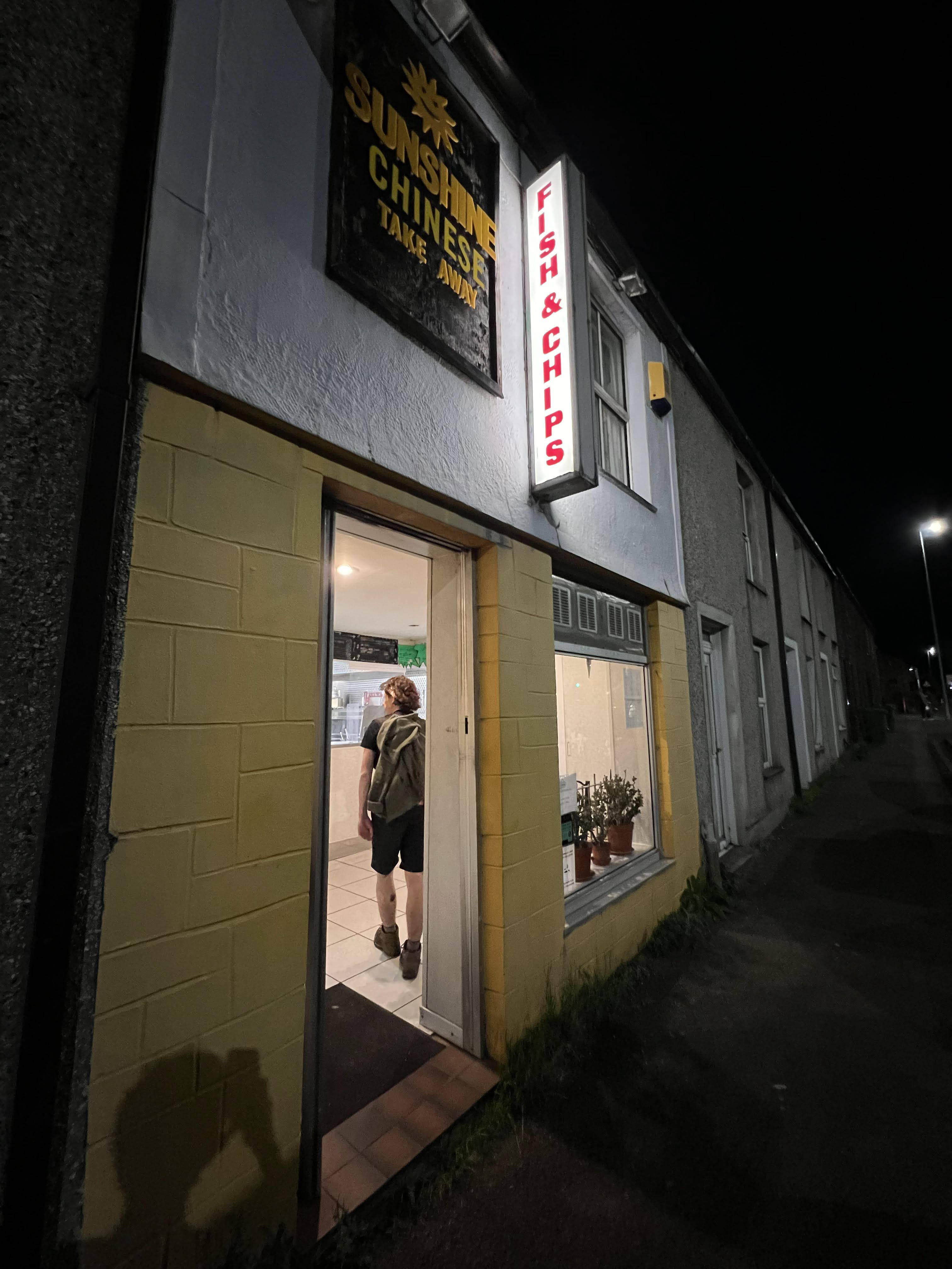 The chinese takeaway marking the end of our adventure. Nick is seen inside.